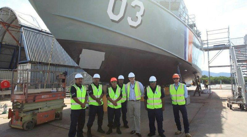 Director RMC North East Mick Saunders with crew members from Lomor and the Norship CEO Olav Groot in Cairns. Story by Claudia Henry. Photo by Warrant Officer Danny Taylor.