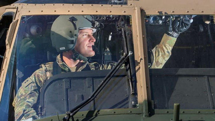 Lieutenant-Colonel Scott Dore conducts pre-flight checks on an Afghan National Army UH-60 Black Hawk at Kandahar Airfield, Afghanistan in 2019. Story by Warrant Officer Class 2 Max Bree. Photo by Corporal Chris Beerens.