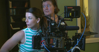 Lieutenant Commander Claire Baldwin, left, from the Directorate Navy Culture, takes control of the camera during the Screen Warriors training program. Story by Corporal Michael Rogers.