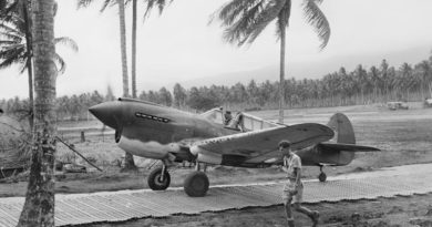 RAAF Squadron Leader Keith W 'Bluey' Truscott taxiing his P-40E Kittyhawk along the Marston Mats at Milne Bay Fighter Strip #3, Milne Bay, New Guinea, Sep 1942. Photo courtesy Australian War Memorial.