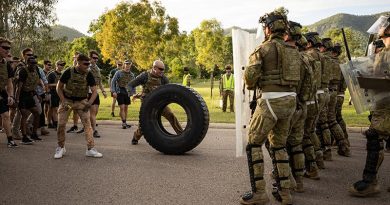 Australian Army soldiers from 3rd Battalion, Royal Australian Regiment and 1st Military Police Battalion defend against role players as part of a Populations Protection Control course at Lavarack Barracks in Townsville, Queensland. Photo by Bombardier Guy Sadler.