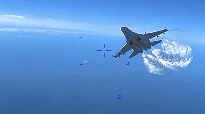 A Russian Air Force Su-27 attempts to dump fuel on a USAF MQ-9 Reaper drone, ultimately causing the drone to crash into the Black Sea.