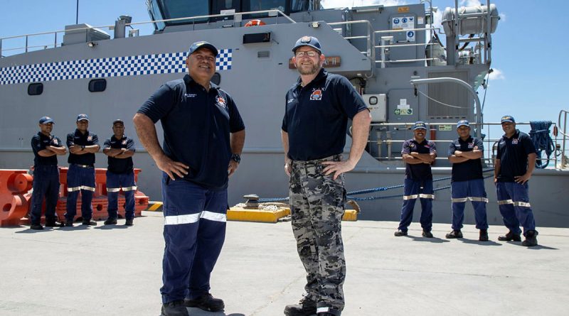 Technical Adviser to the Kiribati Police Service Maritime Unit Chief Petty Officer Lyndon Quirke, right, and Commanding Officer RKS Teanoai II Superintendent Tom Redfern at Tarawa, Kiribati. Story by Lieutenant Carolyn Martin. Photo by Petty Officer Bradley Darvill.