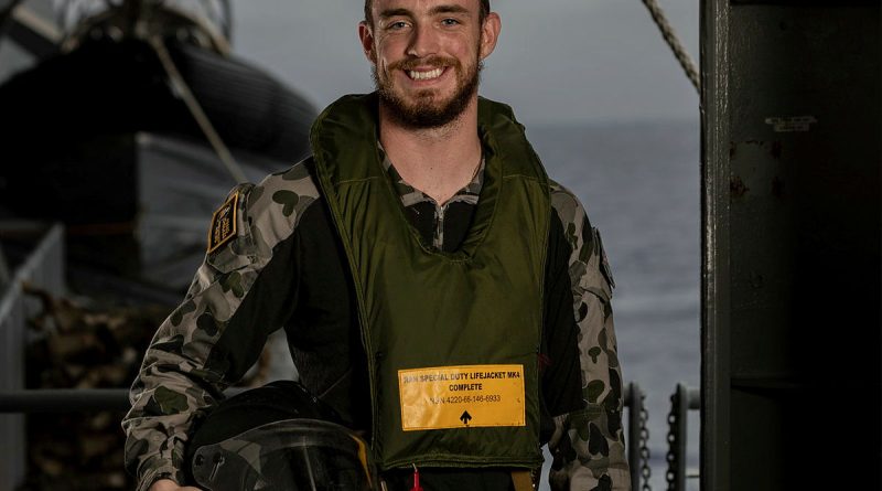 Able Seaman Boatswains Mate Corey Hardy on board HMAS Choules during the MH-60R Seahawk helicopter first of class flight trails. Story and photo by Able Seaman Rikki-Lea Phillips.