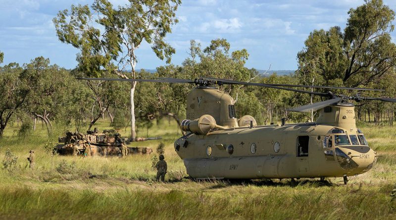 A CH-47 Chinook from the 5th Aviation Regiment conducts a refuel for the 2nd Cavalry Regiment’s M1 Abrams main battle tank at Townsville Field Training Area. Story by Captain Joanne Leca. All photos by Lance Corporal Riley Blennerhassett.