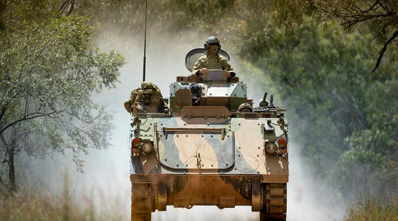 Armoured Personnel Carrier transports soldiers during Exercise Opie Trophy at Townsville Field Training Area. Story by Captain Joanne Leca. All photos by Lance Coporal Riley Blennerhassett.