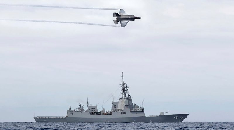 A Royal Australian Air Force F-35A Lightning II aircraft conducts a flypast over HMAS Sydney during Exercise Tasman Shield. Photo by Able Seaman Joshua Bishenden.