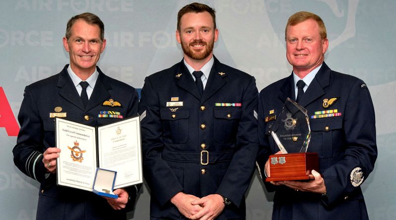 Warrant Officer of the Air Force Ralph Clifton (right) along with the Chief of Air Force, Air Marshal Robert Chipman (left) presents the Enlisted Aviator of the Year Award to Corporal Jack Simpson at a reception commemorating the 102nd anniversary of the formation of the Royal Australian Air Force at the Australian War College, Weston, ACT. Story by Tastri Murdoch. Photo by Flight Sergeant Kev Berriman.