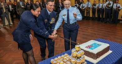Senior ADF Officer Edinburgh Air Commodore Adrian Maso, Flying Officer Trish Noah and Aircraftwoman Emily Wellington cut the cake to mark the 102nd anniversary of the formation of the RAAF. Story by Wing Commander Nicola Frost and Squadron Leader Courtney Jay. Photo by Corporal Brenton Kwaterski.