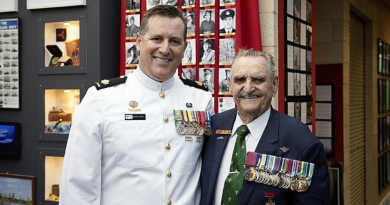 Warrant Officer Bruce Harvey, left, and Mr Keith Payne VC stand in the Military Museum at Comet Bay College in Secret Harbour, WA. Story by Peta Magorian.