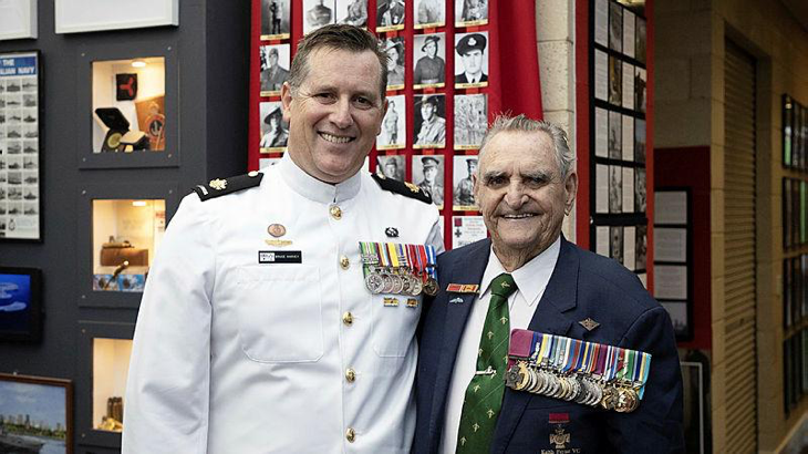 Warrant Officer Bruce Harvey, left, and Mr Keith Payne VC stand in the Military Museum at Comet Bay College in Secret Harbour, WA. Story by Peta Magorian.
