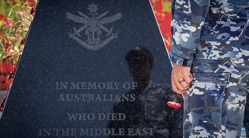 Royal Australian Air Force Flying Officer Aiden Pattison reflects on those who served in the Middle East before him on Operation Accordion in the lead to Anzac Day 2023 at Australia’s operating base in the Middle East Region. Photo by Corporal Melina Young.