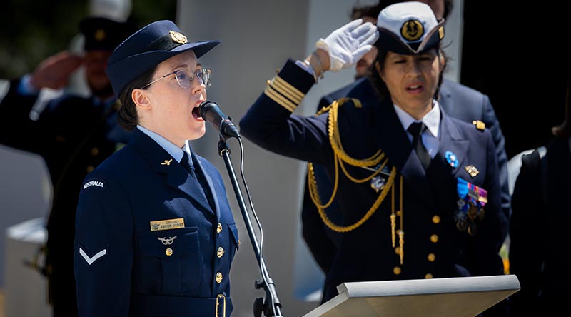 Royal Australian Air Force musician Leading Aircraftwoman Chloe Bruer-Jones sings the French national anthem during a commemoration service at the French Cemetery in Gallipoli. Photo by Corporal Madhur Chitnis.