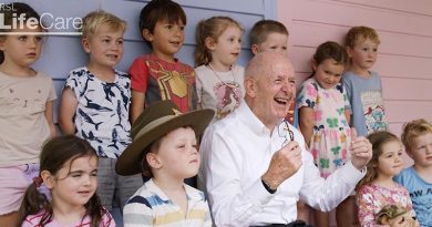 Sir Peter Cosgrove with pre-schoolers from the Little Diggers Pre School, at the RSL LifeCare Anzac Village. Screen grab from supplied video.