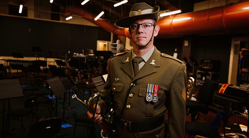 Trumpet and bugle player for the Australian Army Band Sergeant Danny Dielkens in the practice room of the Band of the Royal Military College - Duntroon in Canberra. Photo by Sergeant Oliver Carter.