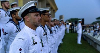 Petty Officer Ryan Kuipers and cremates from HMAS Anzac during the Anzac Day Dawn Service at Kranji War Memorial, Singapore. Photo by Leading Seaman Jarryd Capper.