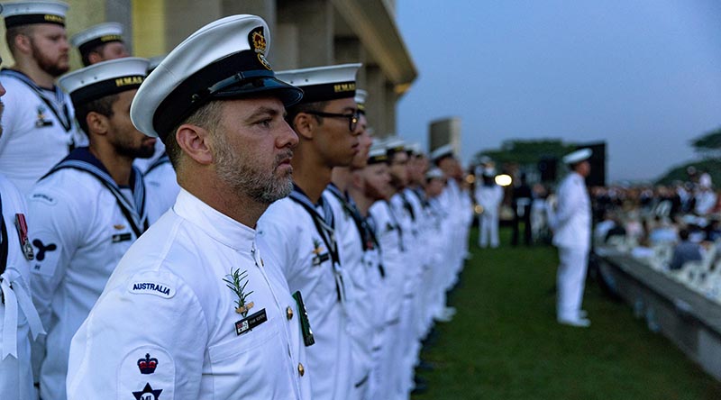 Petty Officer Ryan Kuipers and cremates from HMAS Anzac during the Anzac Day Dawn Service at Kranji War Memorial, Singapore. Photo by Leading Seaman Jarryd Capper.