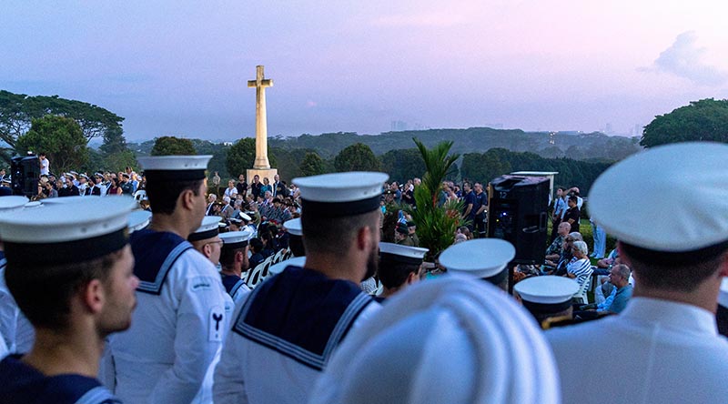 HMAS Anzac ships company stand at ease during the Anzac Day Dawn Service at Kranji War Memorial, Singapore. Photo by Leading Seaman Jarryd Capper.