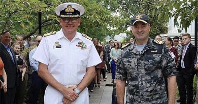 Chief Nuclear Powered Submarine Task Force Vice Admiral Jonathan Mead, right, presents a Federation Star to Commodore Guy Holthouse, left, at Brindabella Park in Canberra. Photo by Scott Bolitho