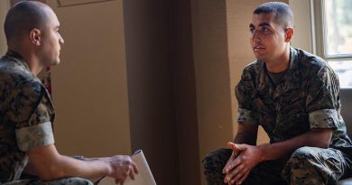 Private First Class Aimal Taraki, right, talks to Corporal Elliot Flood-Johnson from the office of Communication Strategies, at Marine Corps Recruit Depot San Diego. Photo by Lance Corporal Alex Devereux.