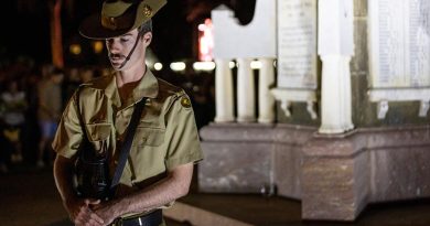 An Australian Army sapper from 3rd Combat Engineer Regiment stands at rest on arms reversed as a part of the catafalque party during the dawn service at ANZAC Park, Townsville, Queensland. Photo by Corporal Brandon Grey.