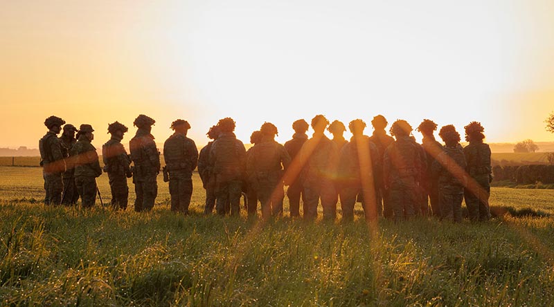 Australian Army soldiers deployed on Operation Kudu attend their own Anzac Day dawn service in the British countryside, taking time out from their Ukrainian-soldiers training duties. Photo by Sergeant Andrew Sleeman.