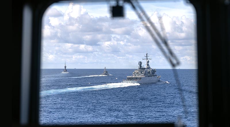 HMAS Anzac conducts Officer of the Watch Manoeuvres with Republic of Singapore Navy RSS Vigliance (left), Royal Malaysian Navy KD Lekir (right) and Gempita (centre) as a part of Exercise Bersama Shield. Photo by Leading Seaman Jarryd Capper.