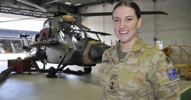 Lieutenant Catherine Gerrard stands in front an ARH Tiger at 1st Aviation Regiment, Robertson Barracks, Darwin. Photo by Flight Lieutenant Nicholas O’Connor.