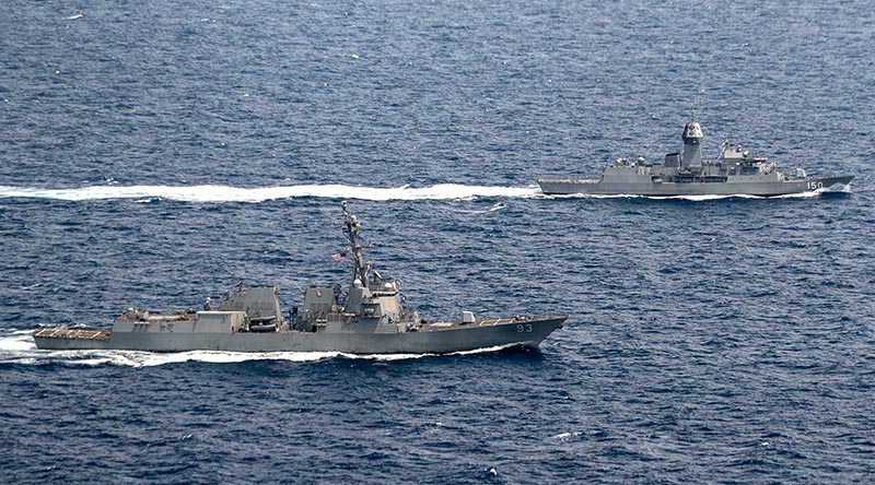 HMAS Anzac (right) sails in company with USS Chung-Hoon through the South China Sea during a regional presence deployment. Photo by Leading Seaman Jarryd Capper.