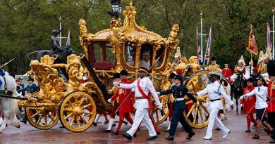 Royal Australian Air Force Corporal Tegan Ross from Australia's Federation Guard with representatives from Commonwealth countries escort the Gold State Coach during the Procession following the Coronation of King Charles III. Photo by Sergeant Andrew Sleeman.