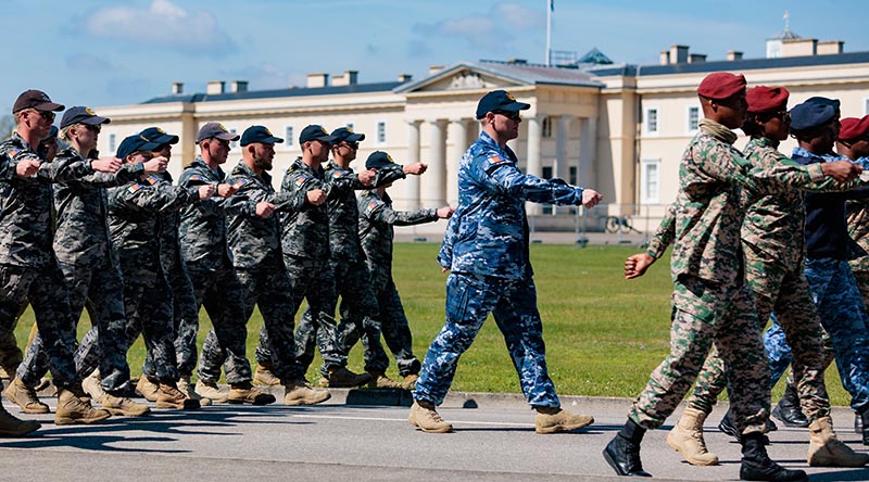 Australia's Federation Guard members march past Old College during a rehearsal for the Coronation of King Charles III, at the Royal Military Academy Sandhurst. Photo by Sergeant Andrew Sleeman.