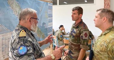 Royal Australian Navy Captain John Cowan (left) and Australian Army Captain Ash Bowers (right), discuss plans for Exercise Croix Du Sud 2023 with French Armed Forces Lieutenant Colonel Matthieu Pieter at the French Marine base in Plum, New Caledonia. Photo by Major Martin Hadley.