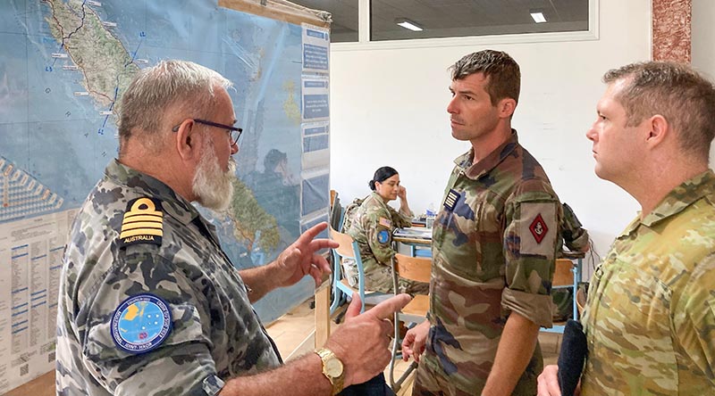 Royal Australian Navy Captain John Cowan (left) and Australian Army Captain Ash Bowers (right), discuss plans for Exercise Croix Du Sud 2023 with French Armed Forces Lieutenant Colonel Matthieu Pieter at the French Marine base in Plum, New Caledonia. Photo by Major Martin Hadley.