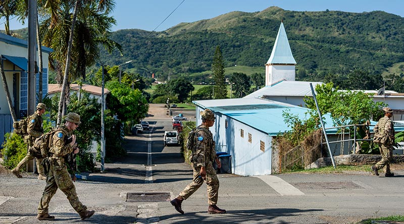 Australian Army soldiers from the 6th Battalion, Royal Australian Regiment, conduct a presence patrol with soldiers from the Royal Gurkha Rifles in Bourail, New Caledonia, during Exercise Croix Du Sud 2023. Photo by Sergeant Brodie Cross.
