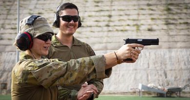 Australian Army Captain David Box instructs range-practice drills with Royal Australian Air Force Corporal Jessica Edwards during Operation Accordion at Australia’s operating base in the Middle East Region. Photo by Corporal Melina Young.