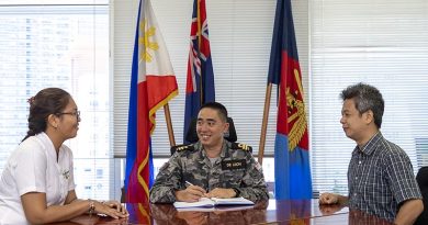 Royal Australian Navy Liaison Officer Philippines, Lieutenant Paolo De Leon briefs Australian embassy defence section staff on upcoming logistic requirements in support of the Joint Australian Training Team - Philippines. Photo by Leading Seaman Nadav Harel.