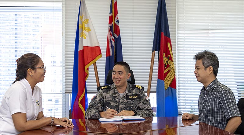 Royal Australian Navy Liaison Officer Philippines, Lieutenant Paolo De Leon briefs Australian embassy defence section staff on upcoming logistic requirements in support of the Joint Australian Training Team - Philippines. Photo by Leading Seaman Nadav Harel.
