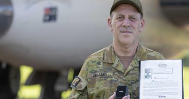 Sergeant Peter Delaney, from Weapon Training Section at No.23 Squadron, displays his second Federation Star and sixth clasp to his Defence Long Service Medal, for 45 years of service with the Royal Australian Air Force, at RAAF Base Amberley, Queensland. Photo by Leading Aircraftwoman Taylor Anderson.