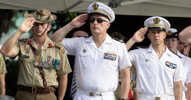 Commander Combat Training Centre Colonel Benjamin McLennan, Captain of the FS La Fayette Capitaine Jean, and Captain of the FS Dixmude Capitaine Emmanuel salute during the French national anthem at a wreathe-laying ceremony at ANZAC Memorial Park in Townsville. Photo by Lance Corporal Riley Blennerhassett.