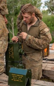 Australian Army sappers from the 2nd Combat Engineer Regiment prepare high explosive charges during the demolition activity of Elanora Bridge a part of Exercise Terrier Walk at Shoalwater Bay Training Area, Queensland.