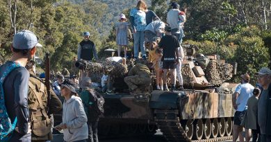 Members of the public have a close look at an M1A1 Abrams main battle tank at the Gallipoli Barracks Open Day 2023. Photo by Corporal Nicole Dorrett.