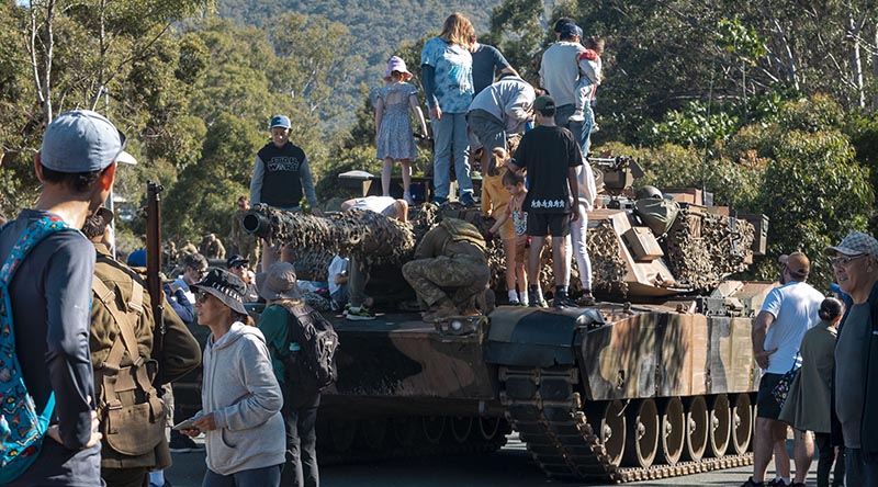 Members of the public have a close look at an M1A1 Abrams main battle tank at the Gallipoli Barracks Open Day 2023. Photo by Corporal Nicole Dorrett.