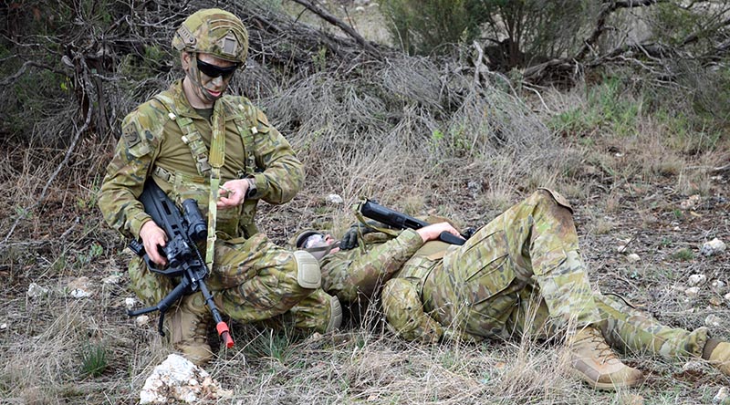 Australian Army soldiers with 144 Signals Squadron train for combat during Exercise Hermes Recon at the Murray Bridge Training Area, South Australia. Photo by Sergeant Adam Barlow.