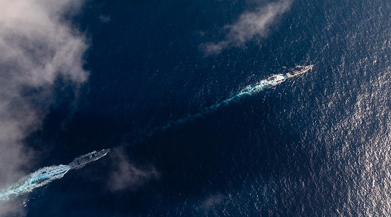 HMAS Anzac conducts officer of the watch manoeuvres with HMAS Perth as they transit north for a regional presence deployment throughout the Indo-Pacific region. Photo by Leading Seaman Jarryd Capper.