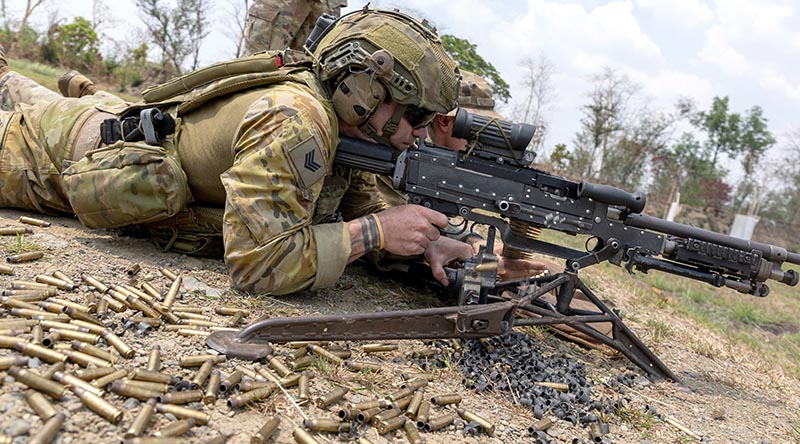 Sergeant Ryleigh Egan, Joint Australian Training Team – Philippines (JATT-P), conducts a live-fire serial with the US Army on the M240B Medium Machinegun at Fort Magsaysay during Exercise Balikatan 23. Photo by Leading Seaman Nadav Harel.