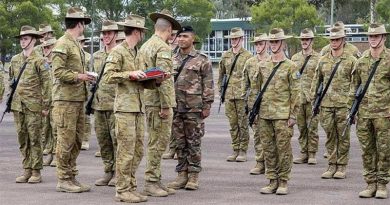 Private Barnabas Koloamatangi speaks with Lieutenant Colonel Richard Thapthimthong after graduating from the School of Infantry Initial Employment Course, Singleton. 