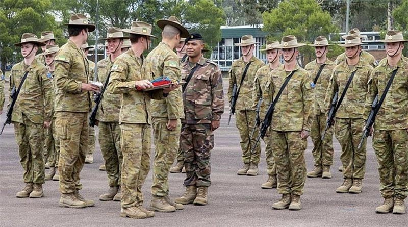 Private Barnabas Koloamatangi speaks with Lieutenant Colonel Richard Thapthimthong after graduating from the School of Infantry Initial Employment Course, Singleton. 