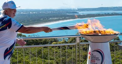 The flame is lit by a torch bearer as the Legacy Centenary Torch Relay begins in Albany, Western Australia, to begin its six-month journey across Australia. Photo by Private Reece Oakes.