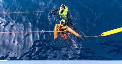 HMAS Anzac swimmer of the watch Able Seaman Mitchell Donovan conducts a rescue swim during a man overboard exercise as a part of Exercise Bersama Shield 2023. Photo by Leading Seaman Jarryd Capper.