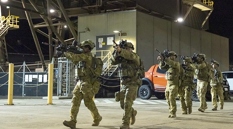 Australian Army soldiers from 1st Battalion, Royal Australian Regiment, conduct a clearance of the Townsville Port on Exercise Septimus Stride 2023 in Townsville, Queensland. Photo by Lance Corporal Riley Blennerhassett.